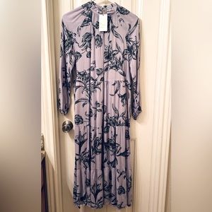 Beautiful light purple with black flower design maxi dress.